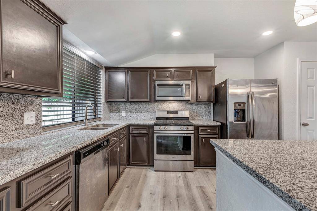 Modern kitchen offering a sleek and functional space.