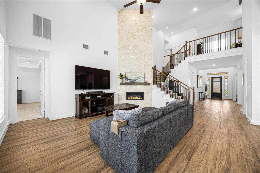 The living room allows space for multiple furniture configurations.