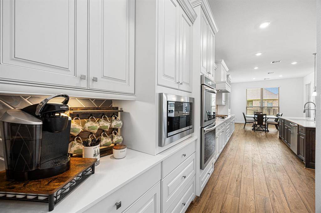 Kitchen offers plenty of counter space for your coffee bar.