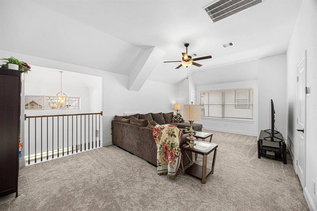 Great space for an upstairs playroom or another living room.
