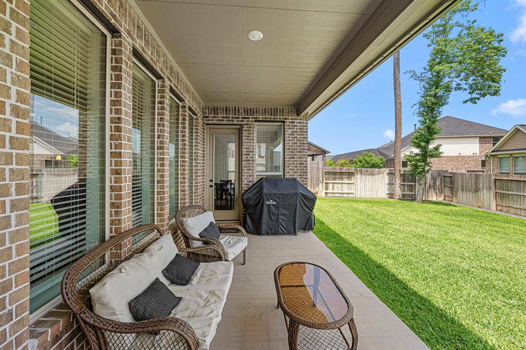 Relaxing covered patio allows you to enjoy the outdoors.