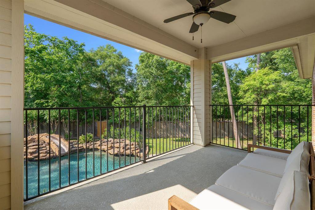 Second floor balcony overlooking the spacious backyard