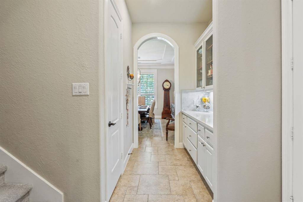 Second back stairway between the kitchen and dining room