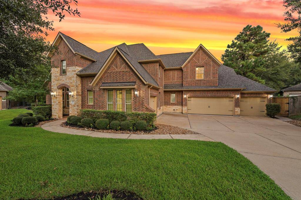 4 full car garage and extended driveway on a cul de sac street.
