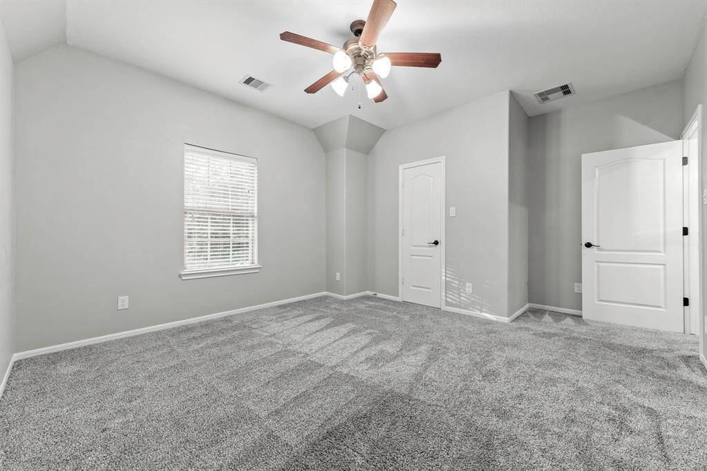 One of 3 upstairs secondary bedrooms all having walking in closets, jack and Jill off 2 bedrooms.