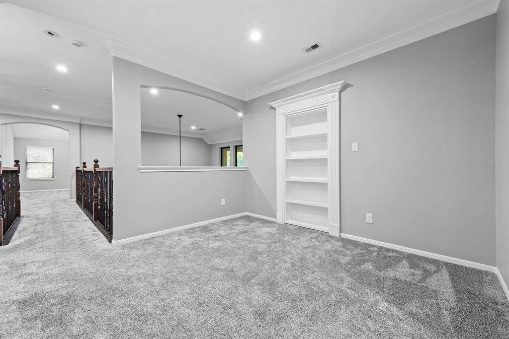 Secret room behind shelving