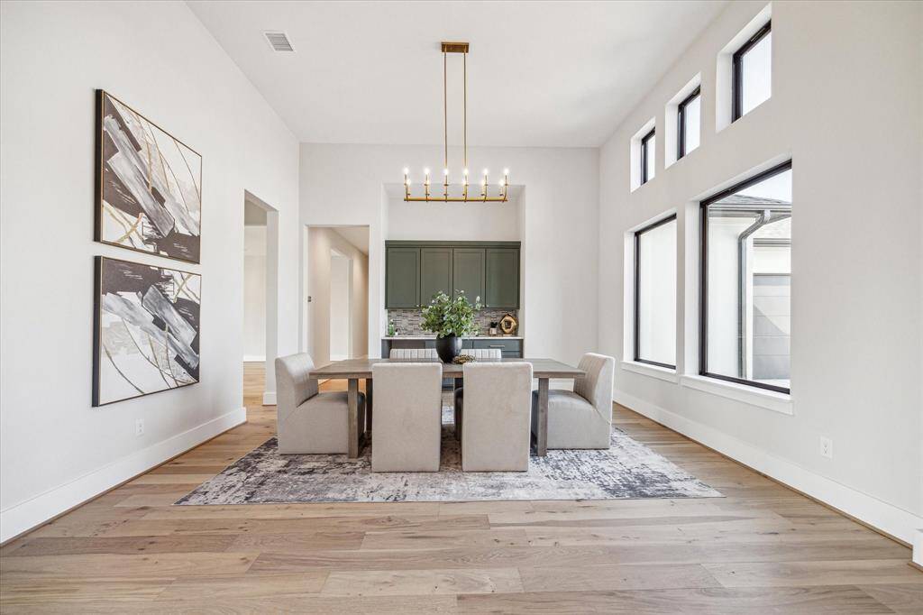 Formal Dining Room has built-in Entertaining Bar with space for beverage fridge