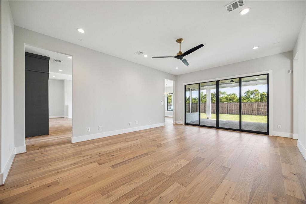 Game Room/Flex Space with sliding glass doors to Back Porch (1 of 2)