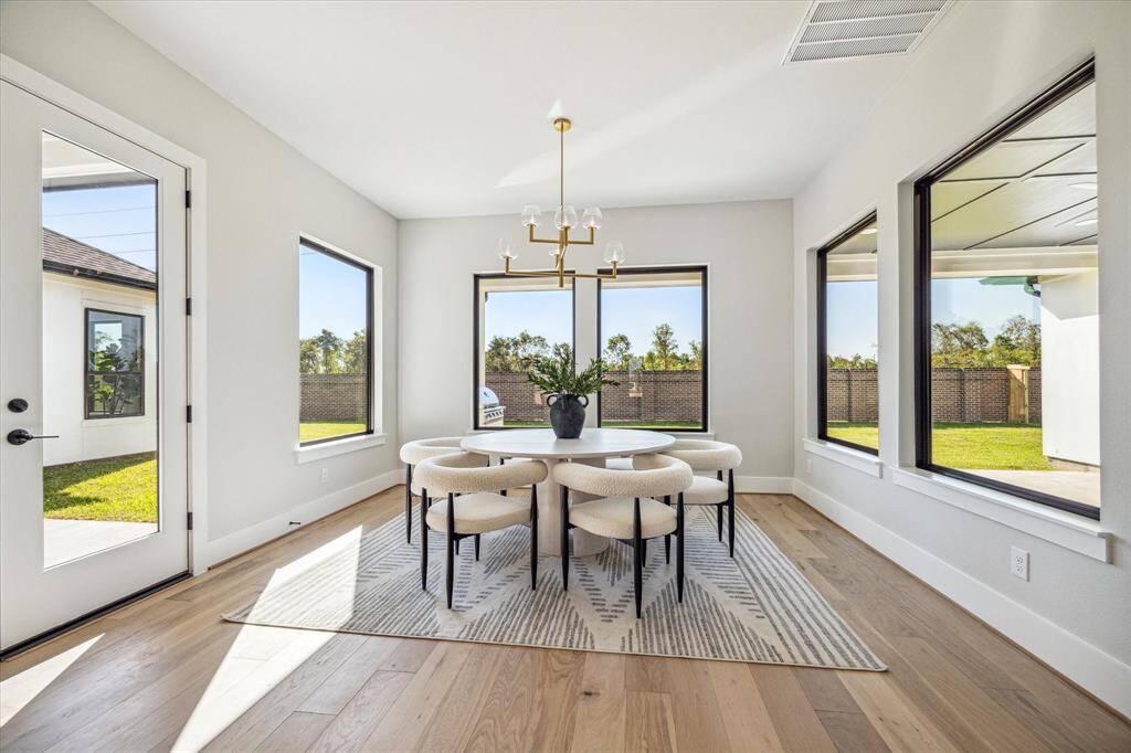Breakfast/Informal Dining Area with access to Back Porch (1 of 2 Back Porches!)