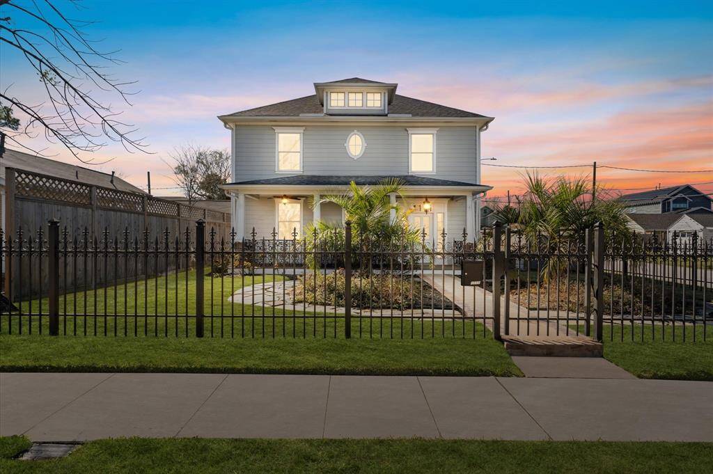 The kind of home that makes you slow down and smile. Wrapped in a classic wrought iron, fleur-de-lis motif fence and gate, this beauty glows at sunset—welcoming you in with charm, comfort, and just a little bit of magic.