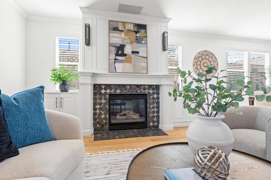 A built-in entertainment hub! Surround sound speakers and custom cabinetry mean movie nights and hosting just got an upgrade.