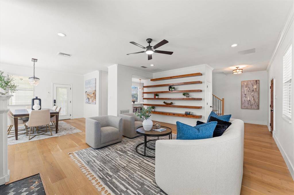 A space designed to bring people together—this home flows effortlessly from living to dining to kitchen for easy entertaining.