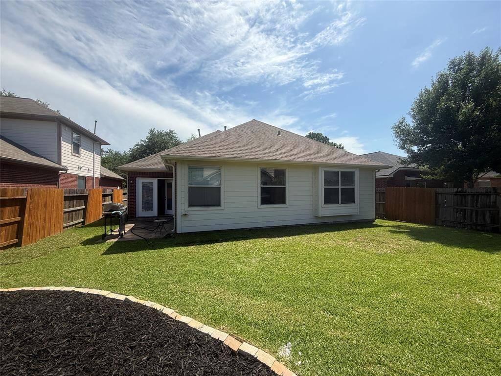 Large fully fenced backyard