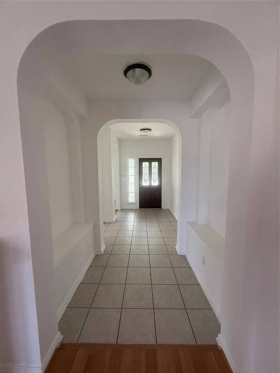 Formal arch entry way.