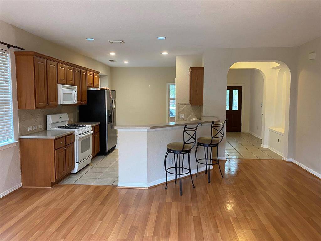 Kitchen open to living room and plenty of natural light.