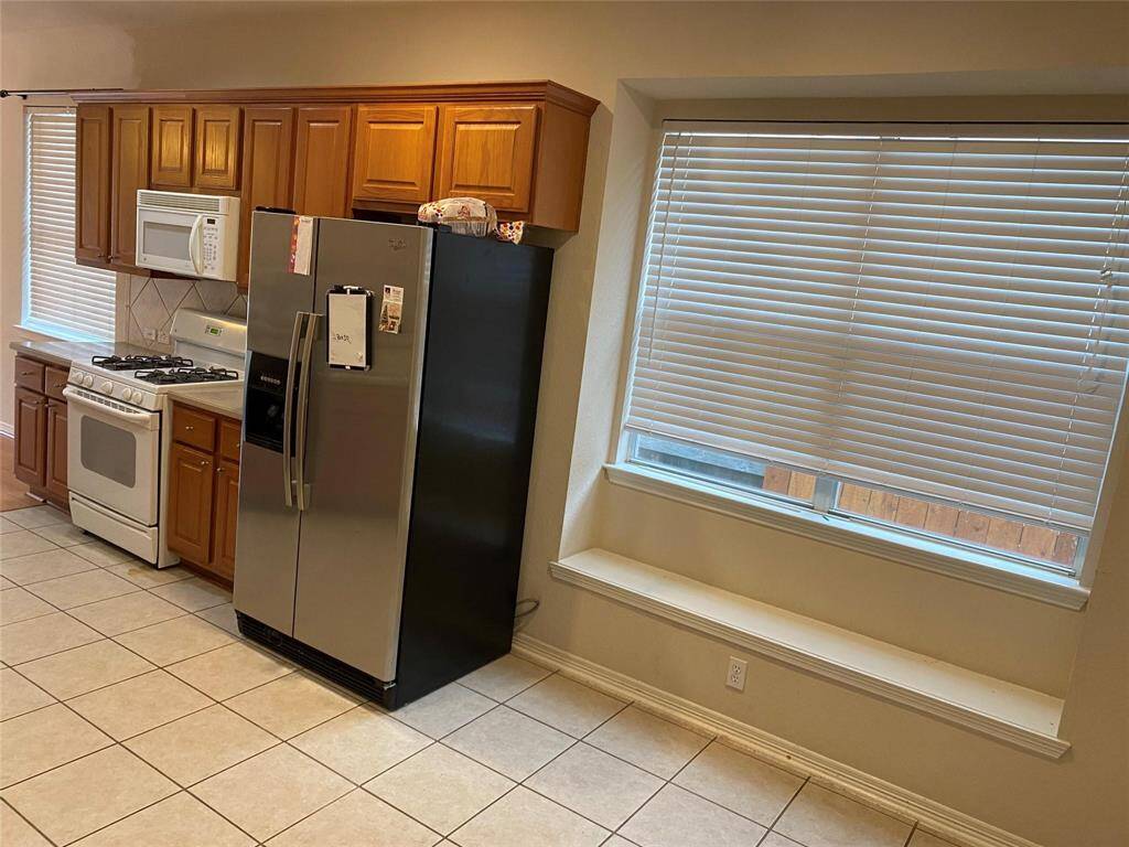 Refrigerator Included.