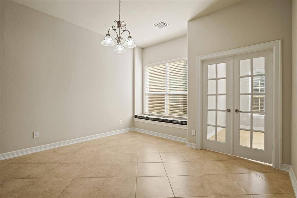 Dine in kitchen with window seat.
