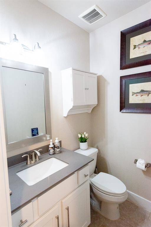 half bath downstairs off garage entry
