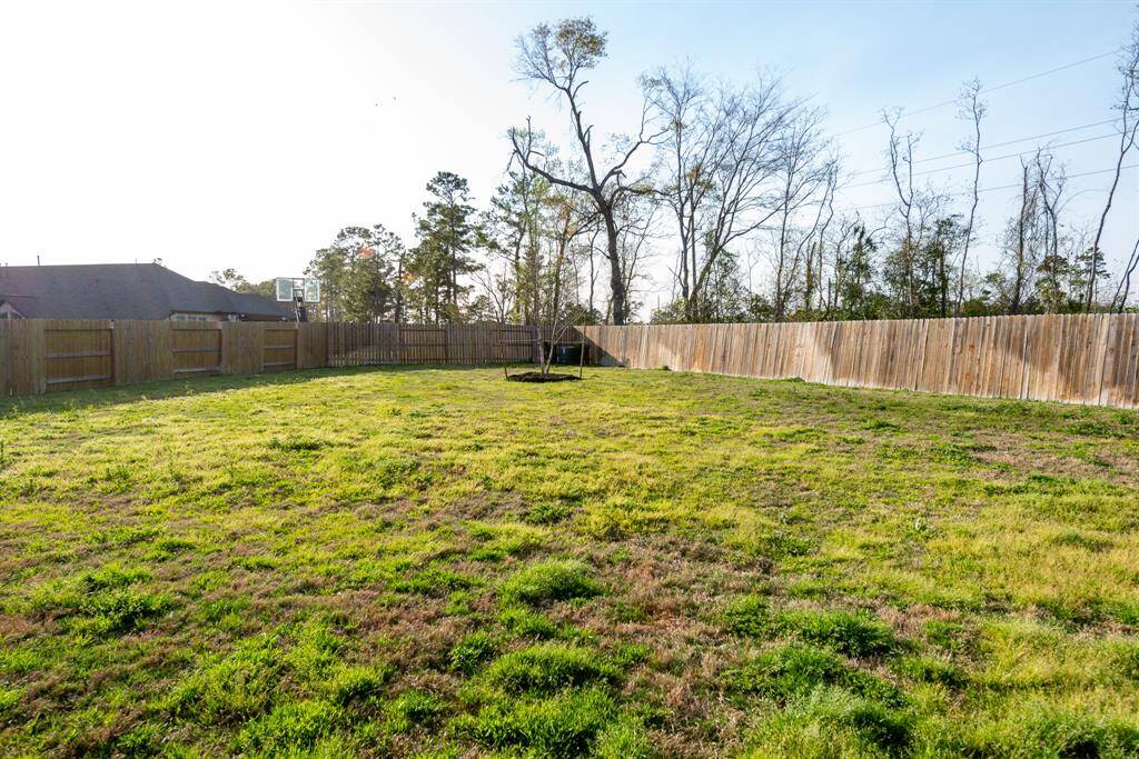llarge privacy fenced in backyard