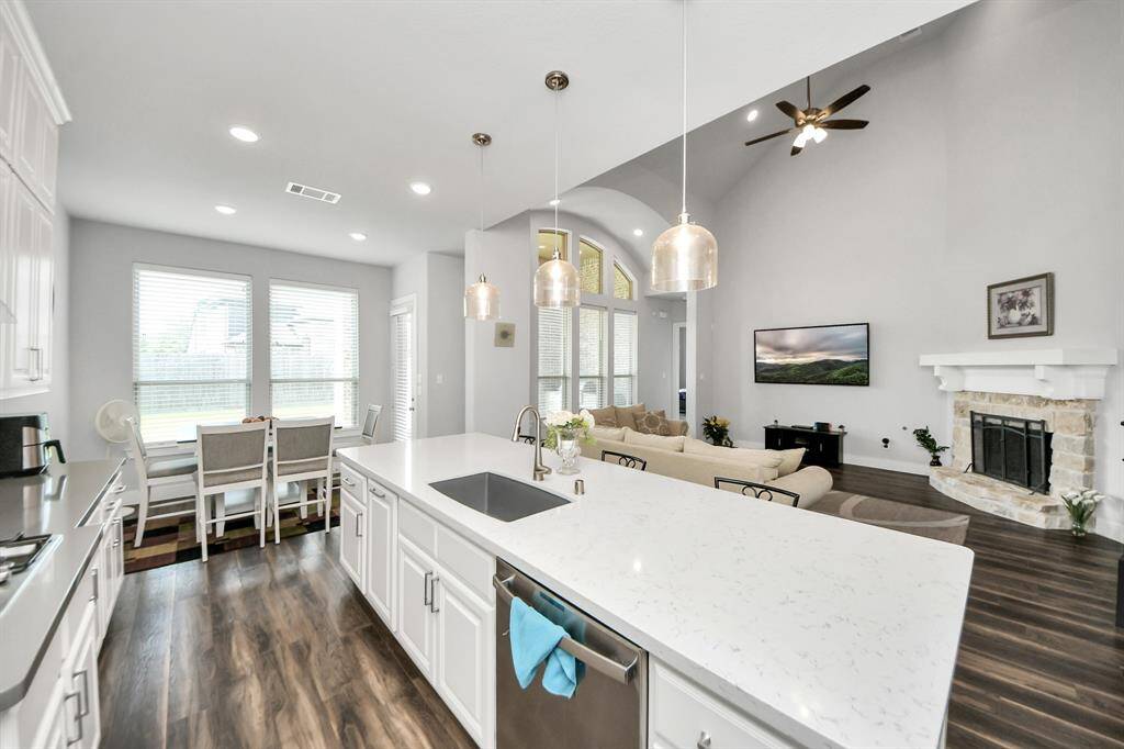 Beautiful kitchen with built-in stainless steel appliances