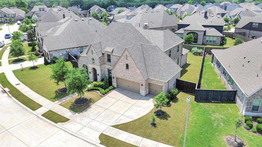 Ariel view of 1203 Orange Pumpkin Ln with huge Driveway!