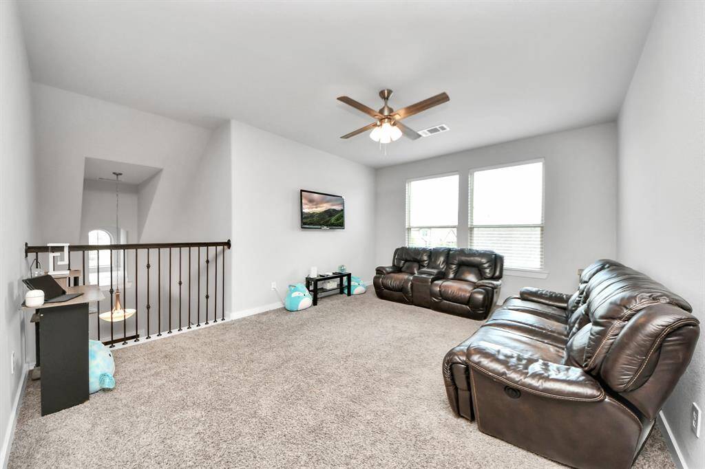 Game room with lots of space for entertainment.
