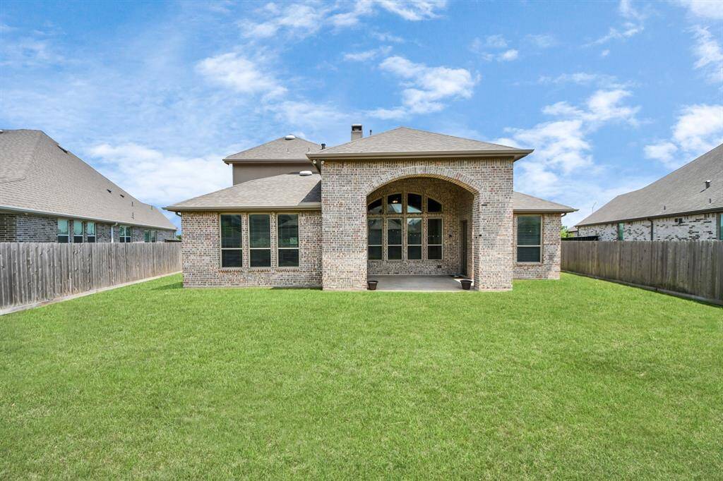 The yard itself is spacious with plenty of room for outdoor activities