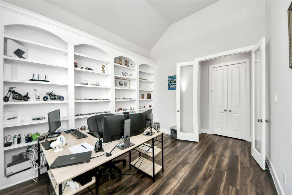 Spacious Office with custom built in bookcase!