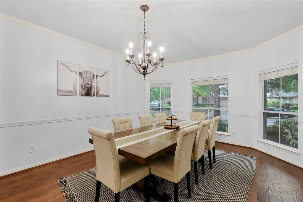 The formal dining room is an elegant space with two entries that's perfect for hosting.