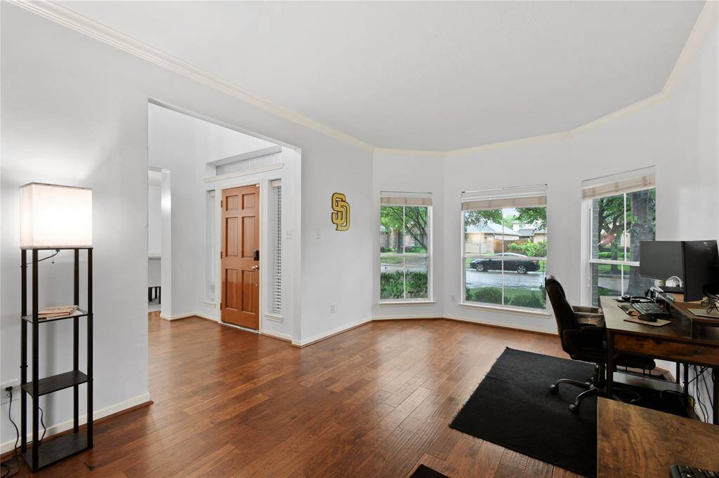 A flex space on the first floor is currently used as an office, but this space offers endless possibilities based on your family's needs.