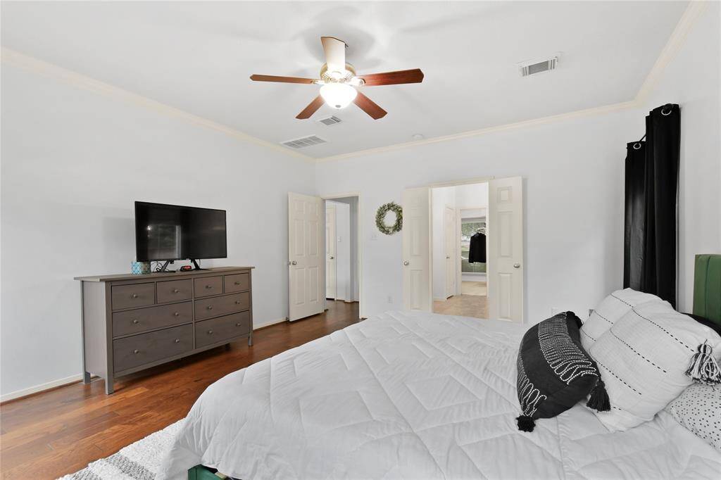 This large first floor bedroom offers great natural light and space for easy furniture arrangement.