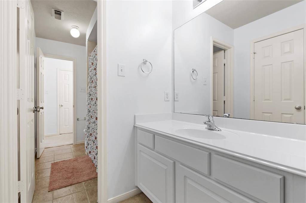 Each bedroom offers private access to a Jack n Jill bath.