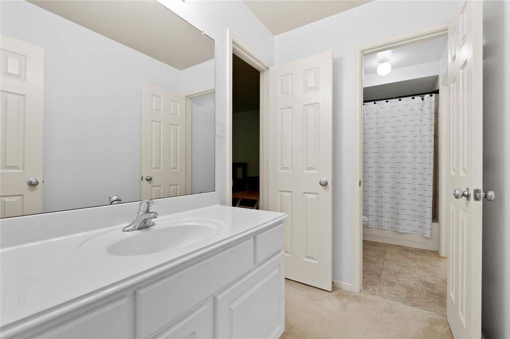 This bathroom is also accessible from the gameroom for easy guest access.