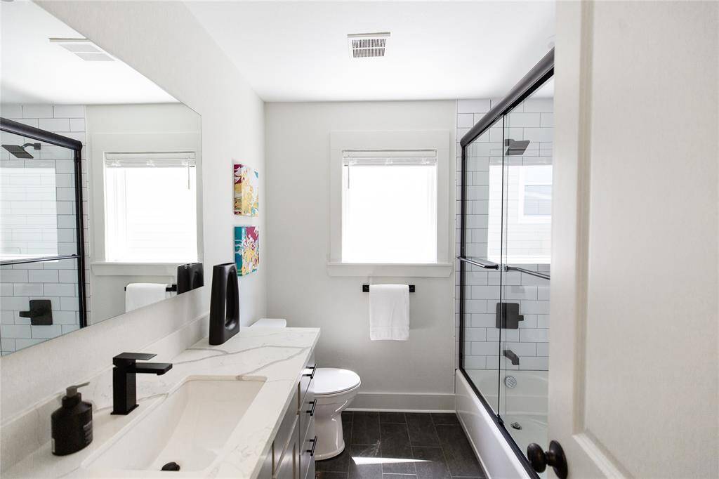 Bathroom located on the West side of home with beautiful quartz counters.