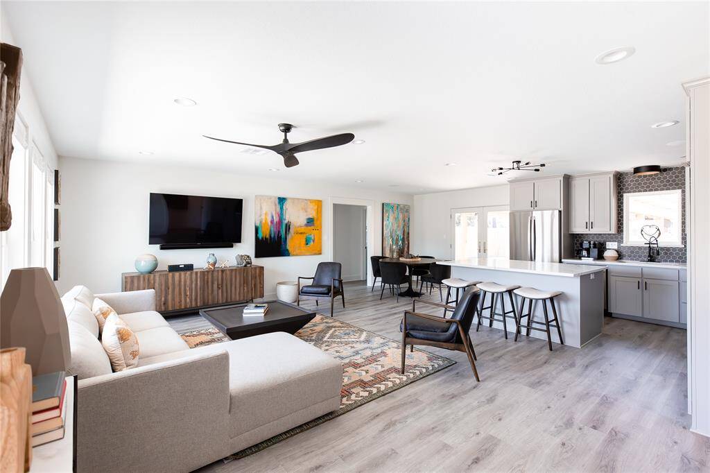 Nice entry into the spacious, light, bright and open living, kitchen and dining space.