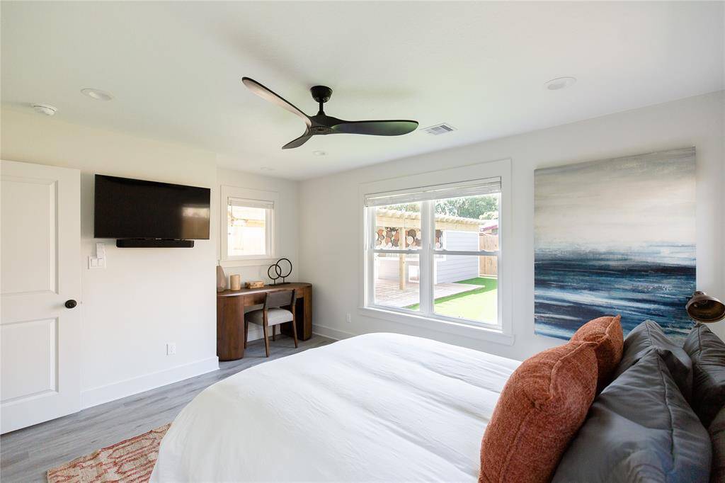 Bedroom with study nook located in the back of home.
