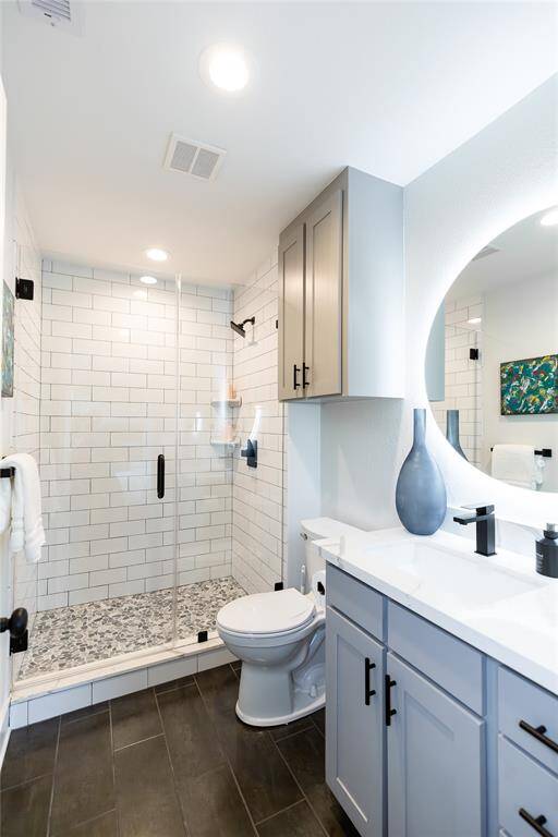 En suite bathroom that is located with the East side back bedroom.