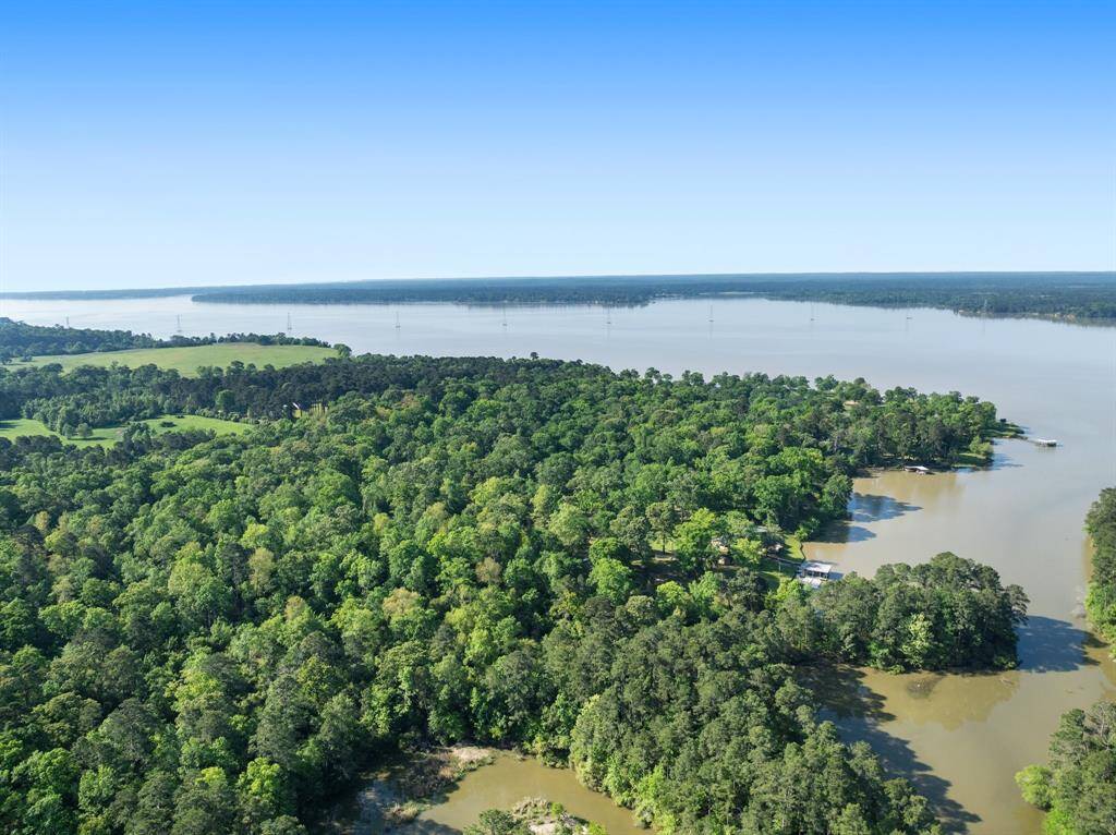 Aerial showing the home on the left to give you the scale of of the cove