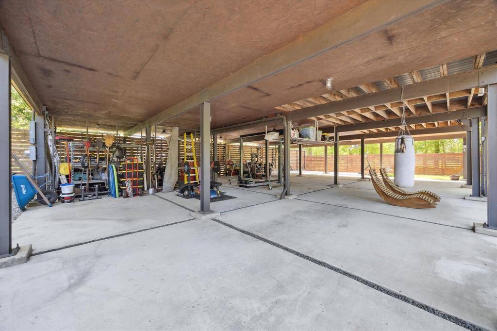The covered space has plenty of room for storage or a sitting area overlooking the pool and backyard.