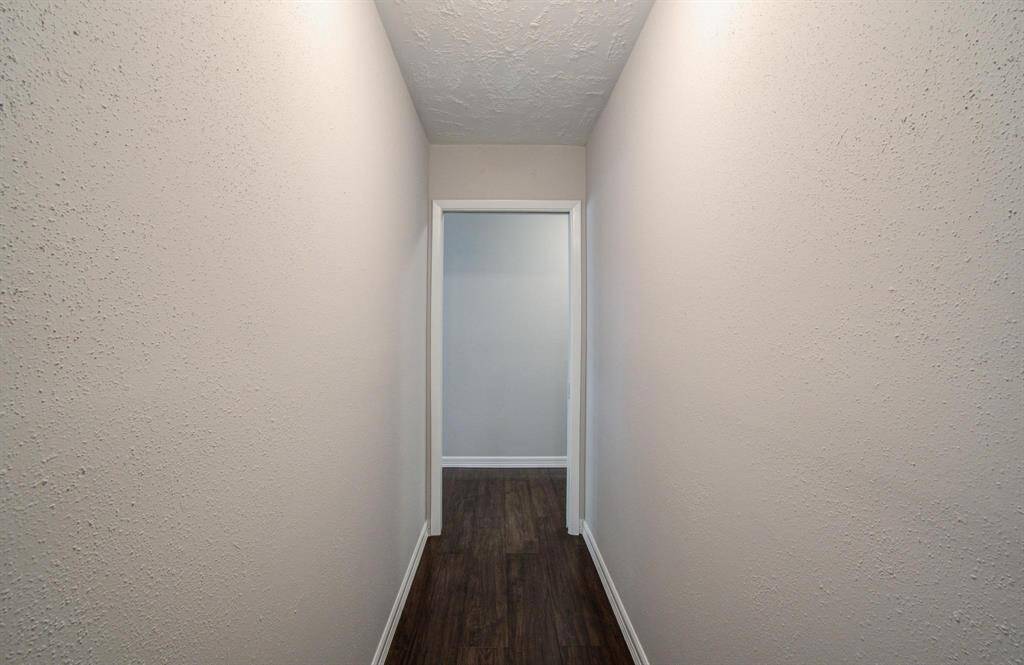 Down the hall, there's a separate MIL suite with over 700 plus sq ft of living space that can be closed off from the rest of the house.