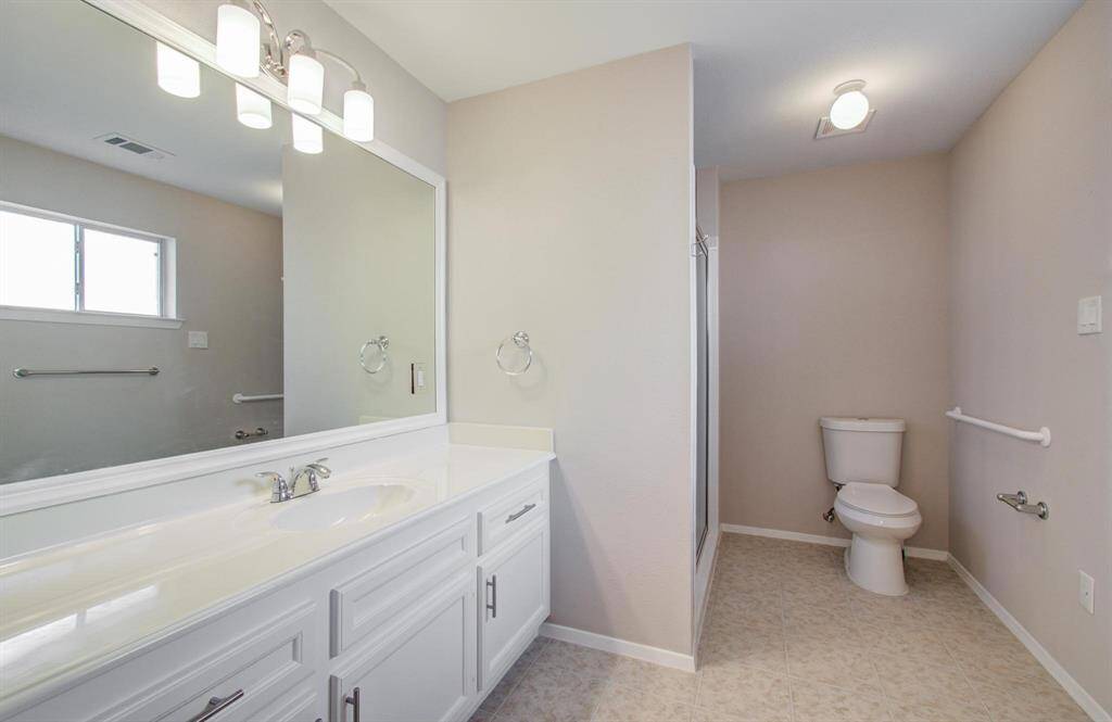 MIL Suite - Bathroom features ADA bars.
