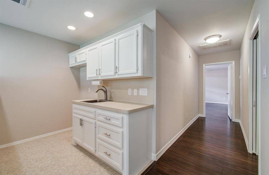 MIL Suite Kitchenette features space for a full size refrigerator.