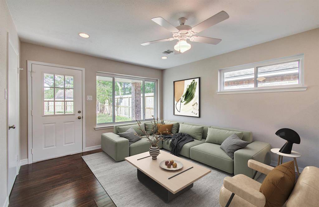 MIL Suite - Living Room Virtually Staged has window overlooking backyard and it's own exterior door.