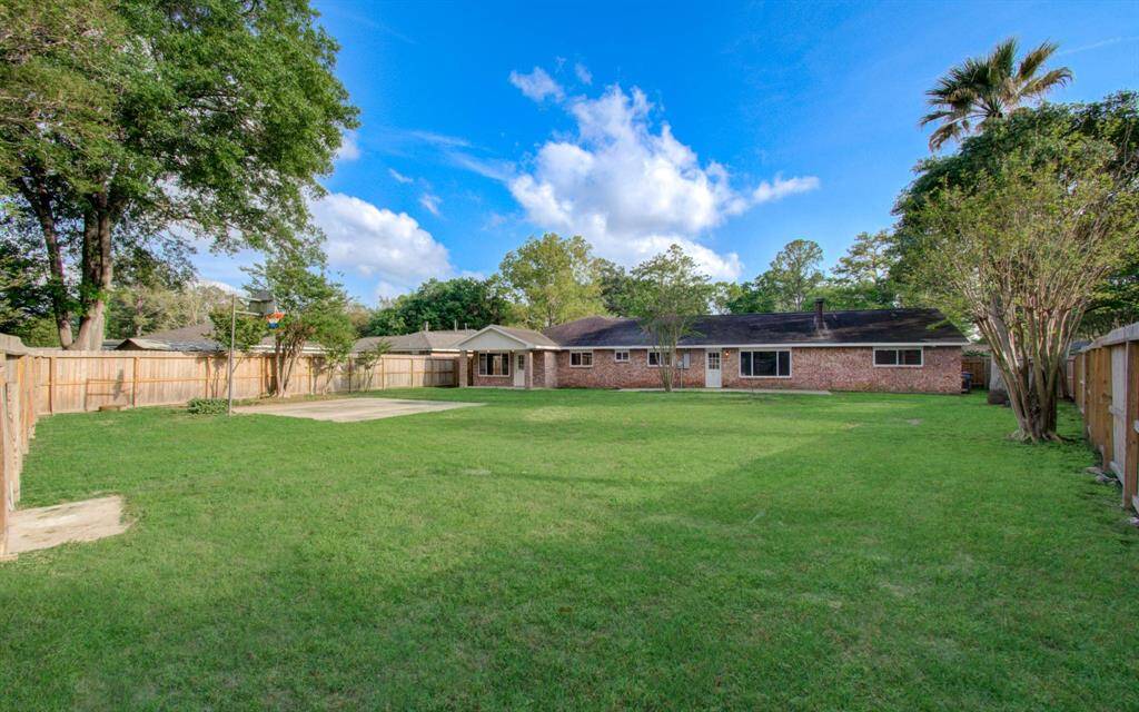 Another view of the expansive backyard.