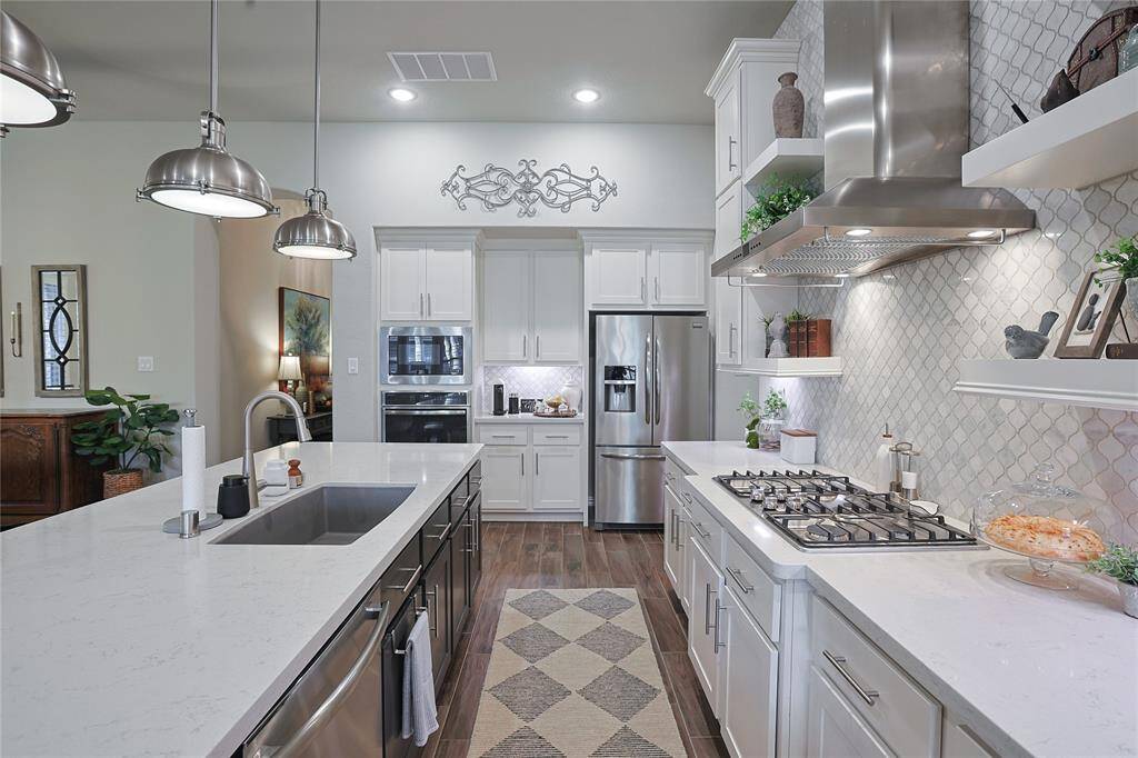 Silestone countertops and crushed granite undermount kitchen sink