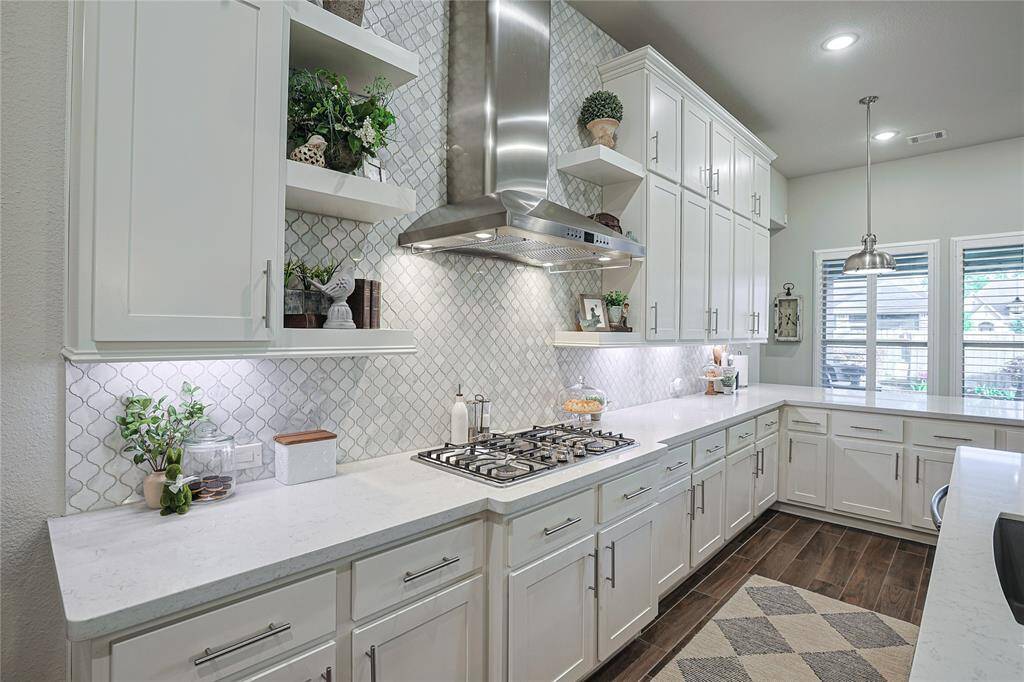 On trend open shelving and cabinet pools additional highlights of the kitchen