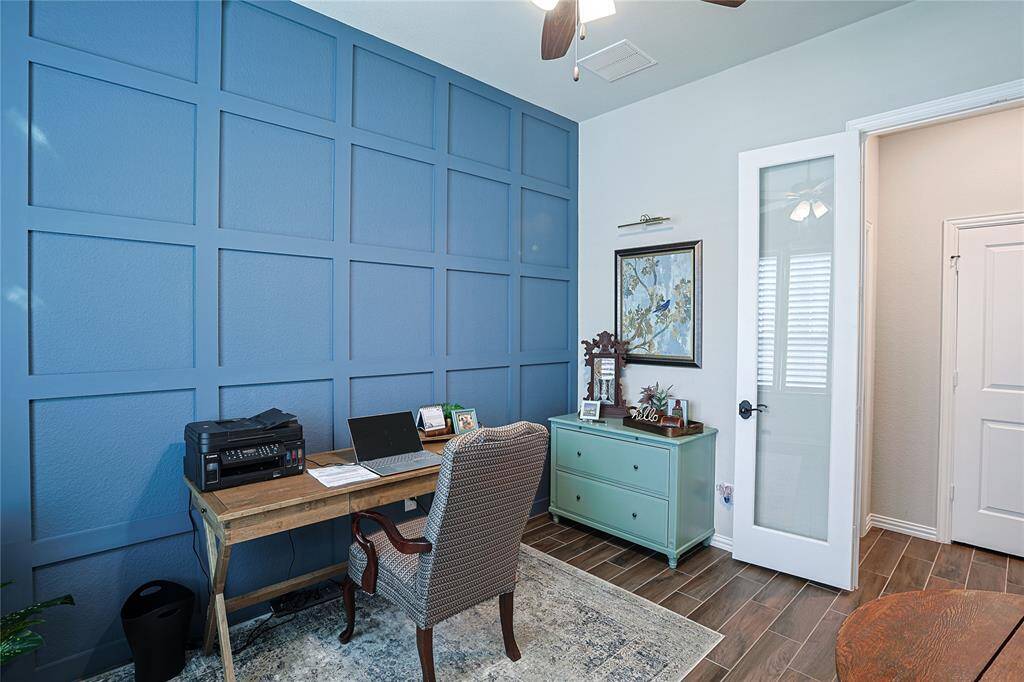 French doors and custom accent wall in Magnolia Blue Skies found n the study