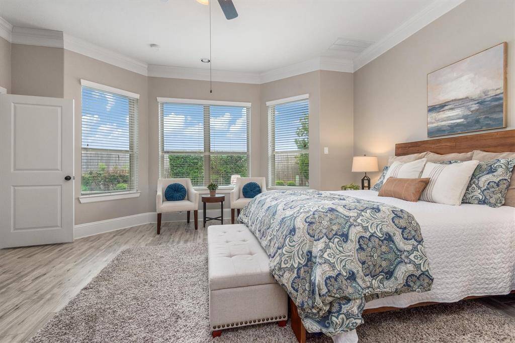 Wake up to a tranquil view of the sparkling pool just outside the bedroom windows.