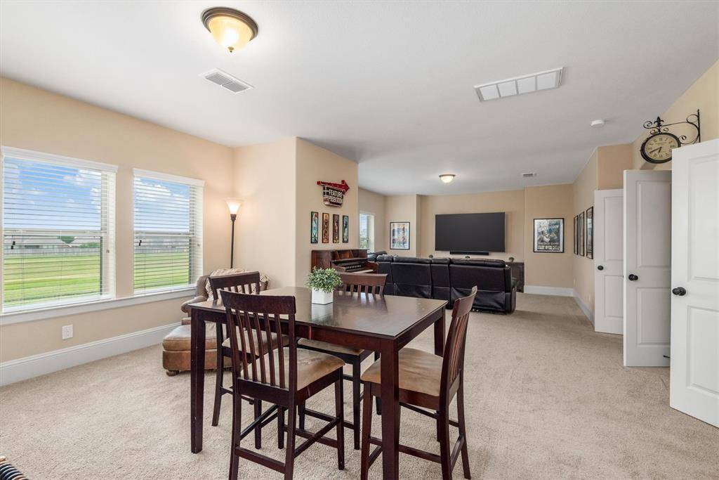 This room is designed for hours of family fun.  This room is large enough for 2 large entertainment areas to be created.