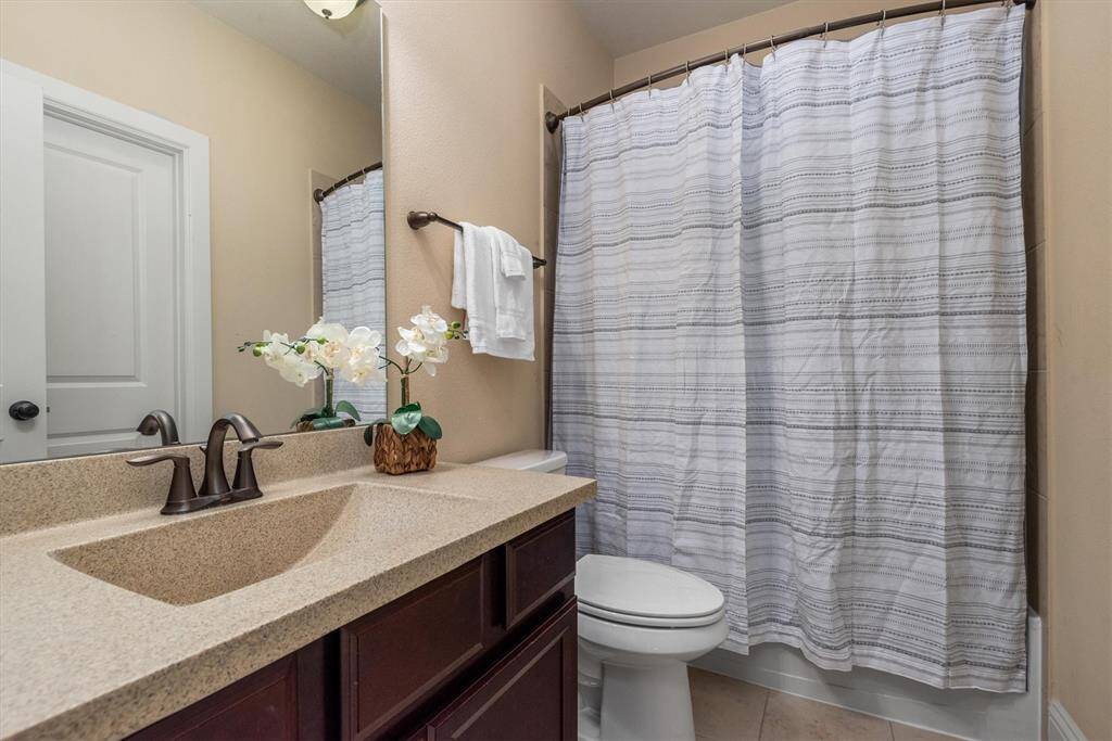 One of 2 secondary bathrooms upstairs.